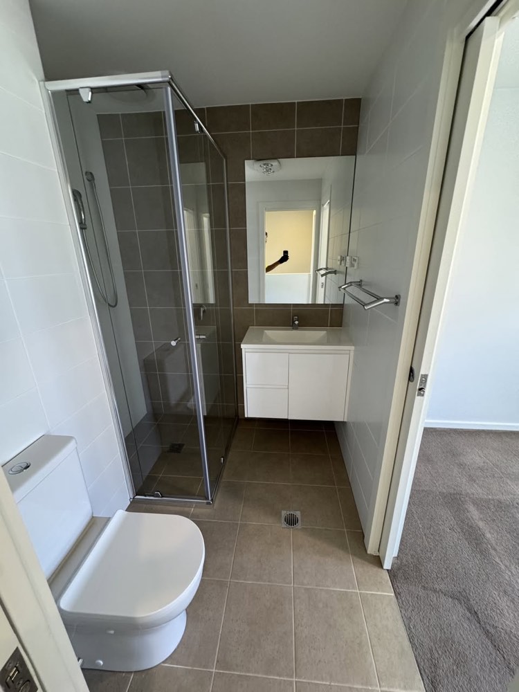 Detailed end of lease bathroom clean with shower screen and tiled floor