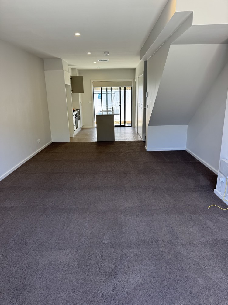 Empty living area after professional end of lease cleaning